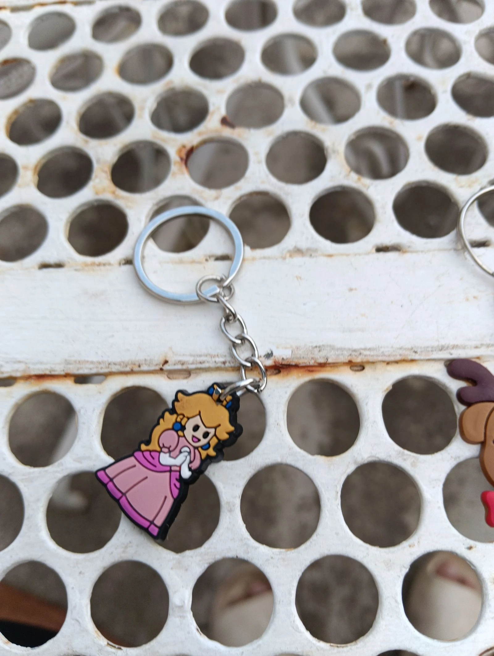 Porte clé princesse rose neuve 